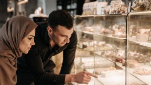 Man and Woman Buying Pastries