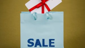 Sale Text On Blue Paper Bag With Gift Box